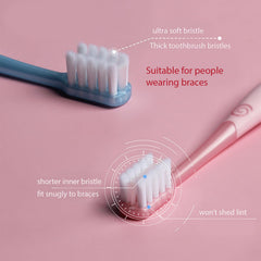 Braces toothbrush with tongue cleaner feature (pink)
