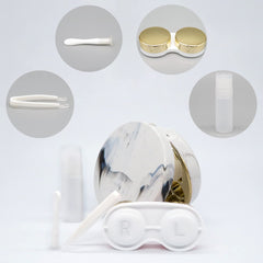 Open marble gold contact lens case showing compartments