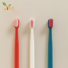 Brush head angled to highlight bristles and head design