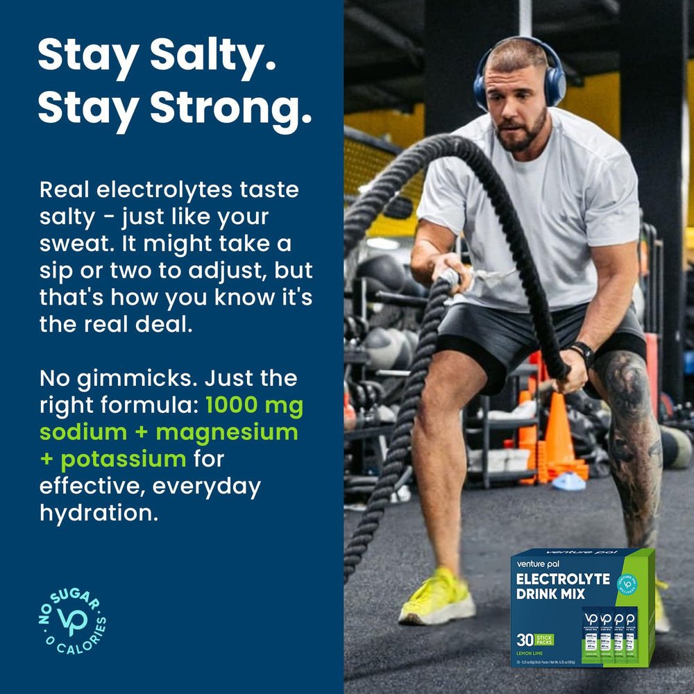 Close-up of electrolyte powder being poured from a stick into water