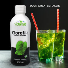 Pouring Vidanat Liquid Chlorophyll into a glass