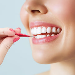Interdental brush cleaning between teeth for braces