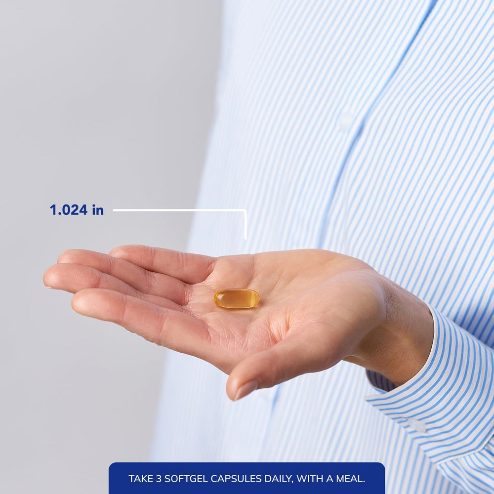 Softgel capsules spilled next to VisionPro bottle