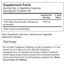 Close-up view of Vitacost Red Yeast Rice supplement packaging and serving size
