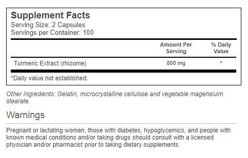 Close-up of Vitacost Turmeric Extract capsules and bottle label highlighting 800 mg per serving