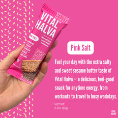 Vital Halva bar cross-section reveals almond and sesame texture with fiber-rich bite.