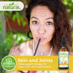 Dropper dispensing Vitamin C liquid drops