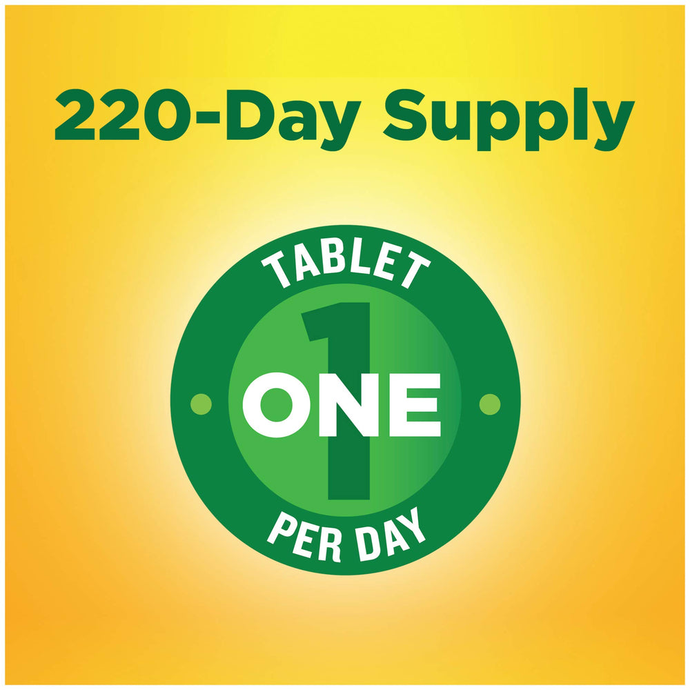 Vitamin D3 bottle with tablets spilled on a white surface