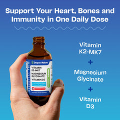 Close-up of dropper dispensing the liquid supplement with D3, K2 MK7 and magnesium glycinate