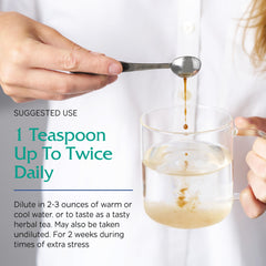 Vitanica Adrenal Tonic bottle in green glass packaging