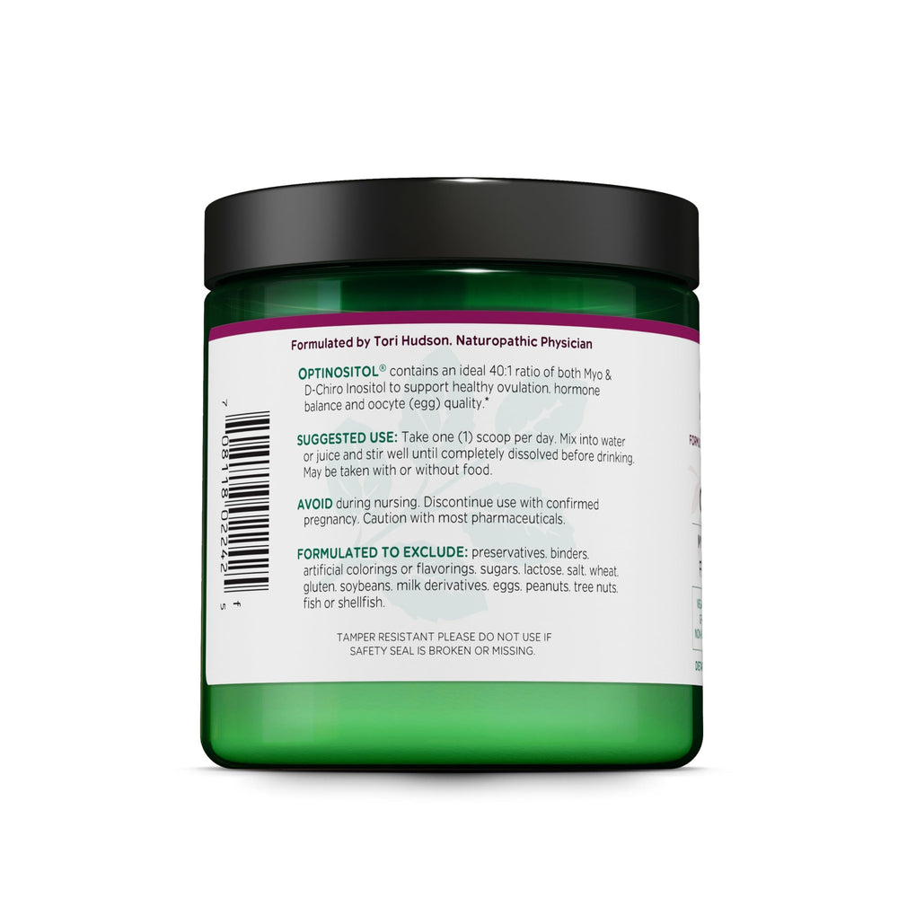 Vitanica scoop beside a teaspoon for visual serving size comparison