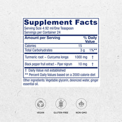 Close-up of golden turmeric liquid in a dropper