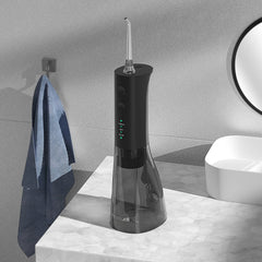 Water flosser in use for oral care