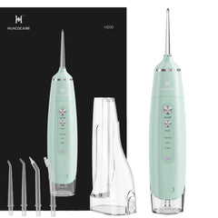 Water flosser with dual tanks in light green