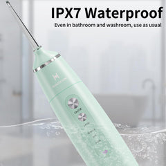 Includes flosser unit, two tanks, nozzles, charging cable, and manual