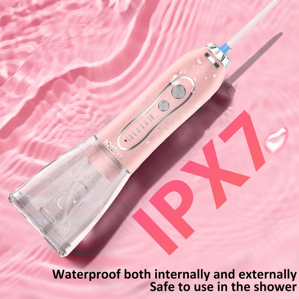 IPX7 waterproof pink water flosser