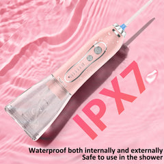 IPX7 waterproof pink water flosser