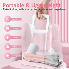 Travel-ready pink water flosser with charging indicator