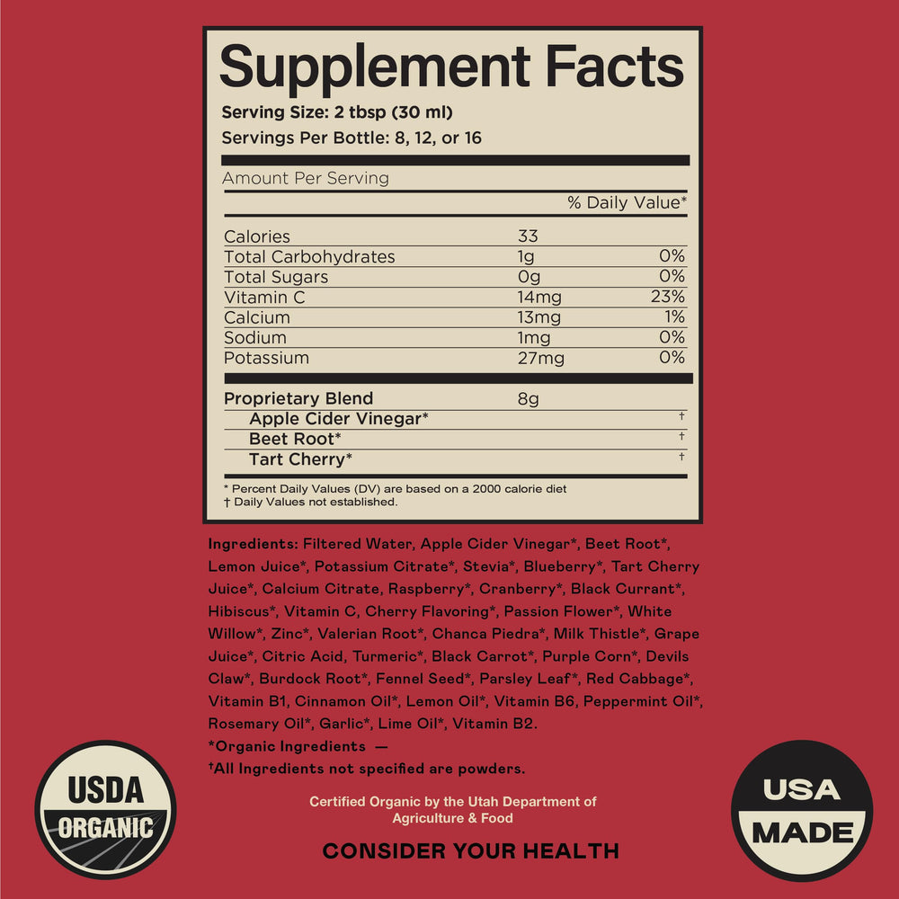 Glass of water with the uric acid liquid supplement