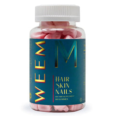 Bottle of WEEM Hair Skin and Nails Gummies with colorful gummies visible