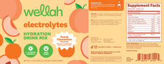 Wellah Electrolytes Peach Clementine tub with scoop ready for mix.