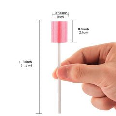 wellgler ICU suction toothbrush connected to suction tubing