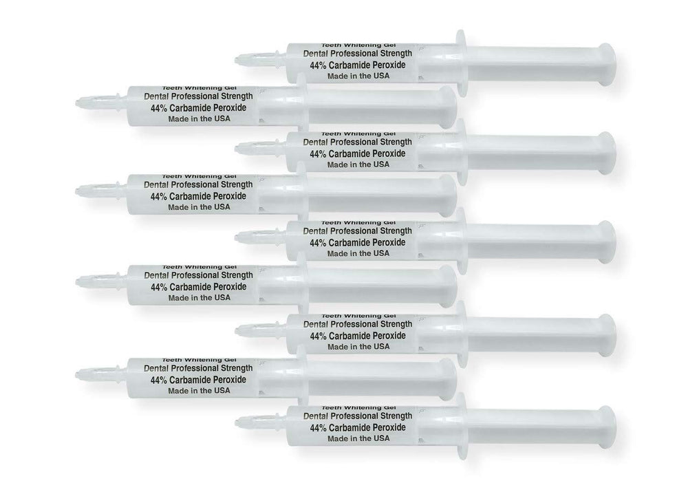 Close-up of White Teeth Global 44% carbamide peroxide whitening gel syringe (1 of 2).