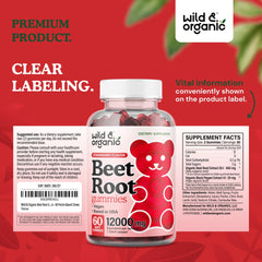 Person taking a beet root gummy in a lifestyle setting