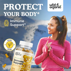 Close-up of elderberry banana-flavored immune gummy with 60-count bottle