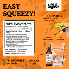 Dropper and bottle on wooden surface