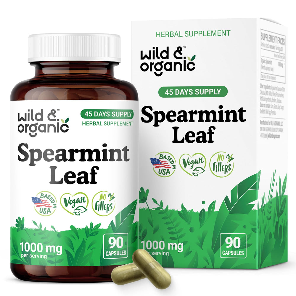 Bottle of Wild & Organic spearmint capsules showing digestive support benefits