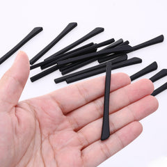 Temple tips attached to eyeglass legs showing anti-slip design
