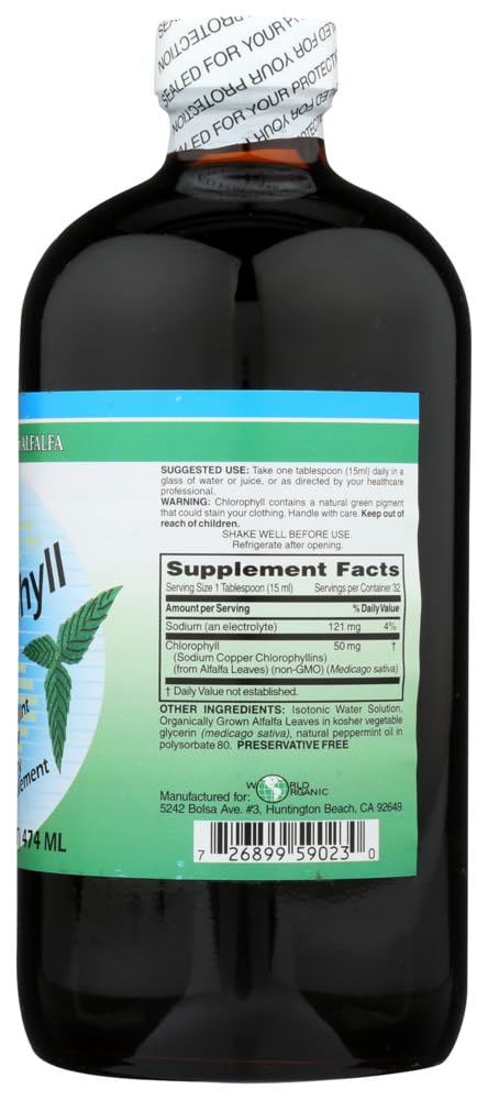 Pouring World Organic Liquid Chlorophyll Mint into a glass with mint garnish