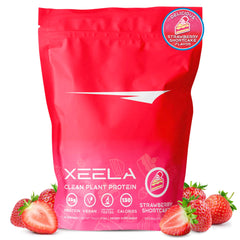 Xeela Strawberry Cake plant-based protein powder tub – front view