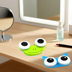 Open blue frog lens case showing interior compartment