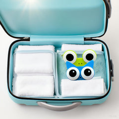 Open green frog lens case showing interior compartment