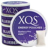 XQS packaging shows blueberry-mint energy pouches, offering nicotine-free energy on the go.