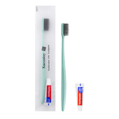 Green wrapped travel toothbrushes for hotels and shelters