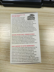 Reishi capsule arrangement on white background