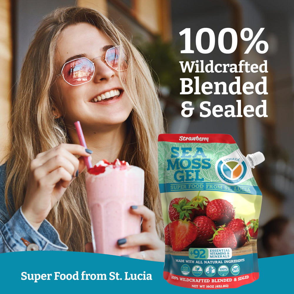 Wildcrafted seamoss gel in glass jar with fresh strawberries