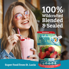 Wildcrafted seamoss gel in glass jar with fresh strawberries