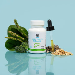 Daily cleansing concept with capsules and glass of water