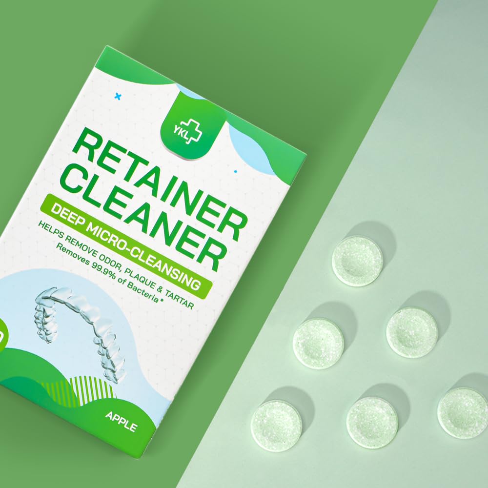 YKL retainer soaking in a glass with restored clarity benefit