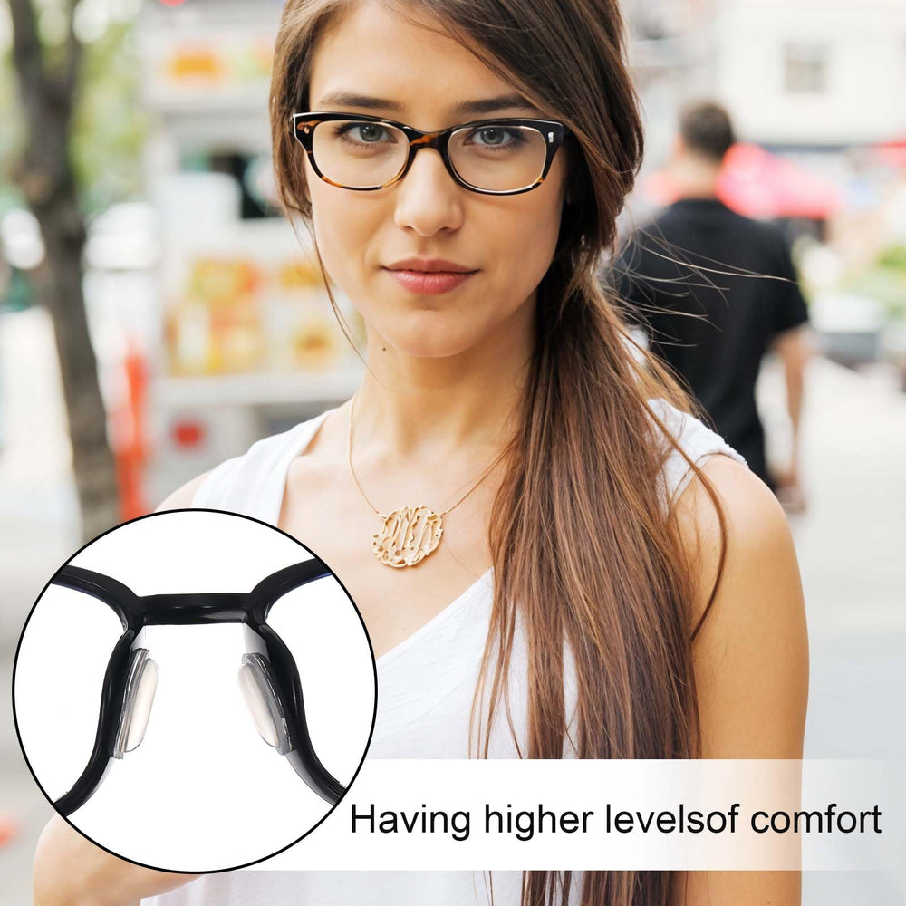 Glasses showing nose pads applied in use