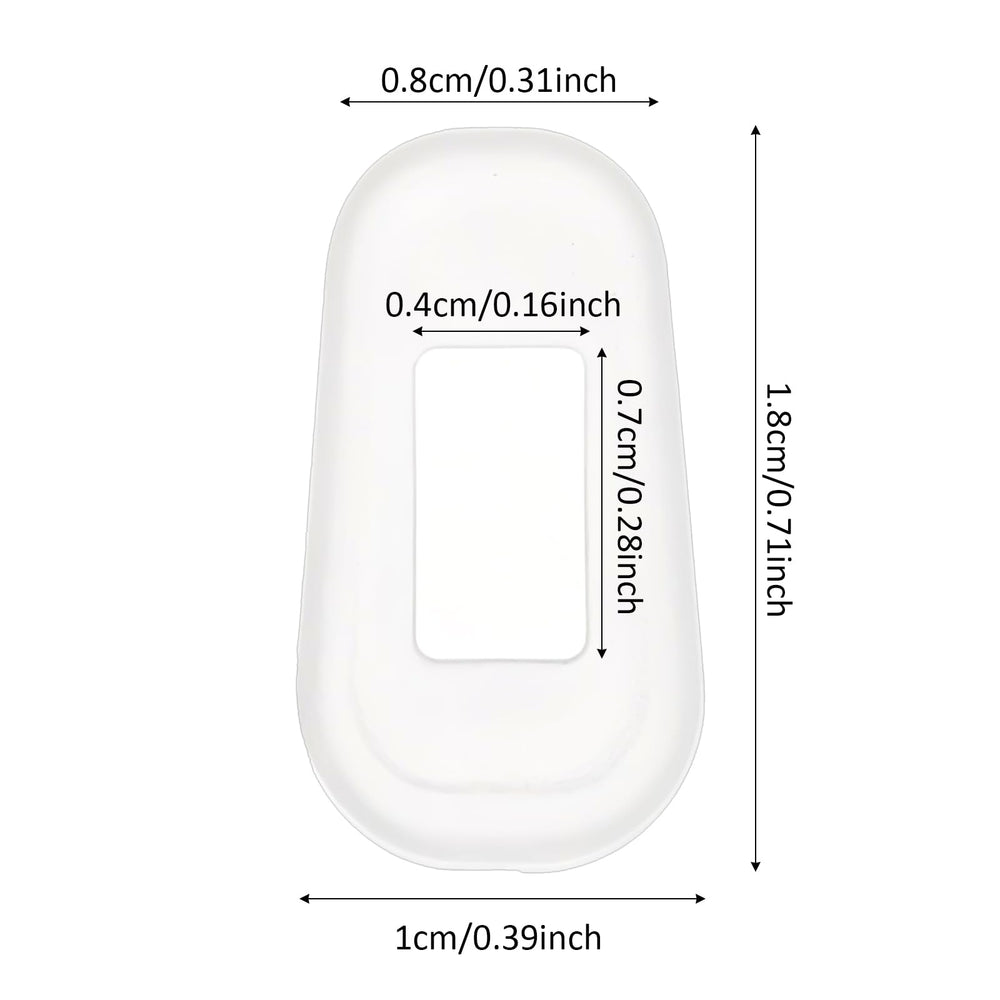Close-up of slip-on nose pads fitting a plastic eyeglass frame