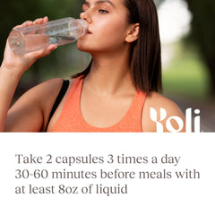 Hand holding Yoli Resolve capsule before a meal showing pre-meal use