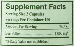 Close-up view of YS Organics Bee Pollen capsules in a pack of 2