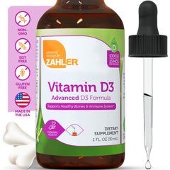 Close-up of vitamin D3 dropper dispensing drops