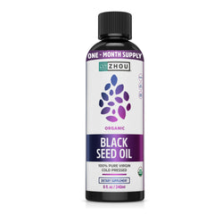 ZHOU Organic Black Seed Oil bottle with label, emphasizing pure quality and daily use benefits