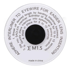 Roll of lens interliner material on a workshop bench